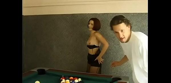  Innocent-looking redhaired girl Sinita poses for her friend on the pool table and takes some lessons in  eightball game